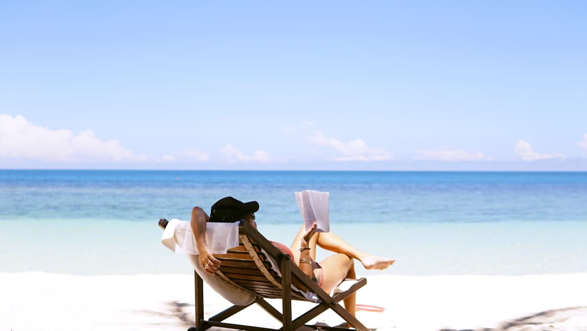 Person relaxing on a beach chair